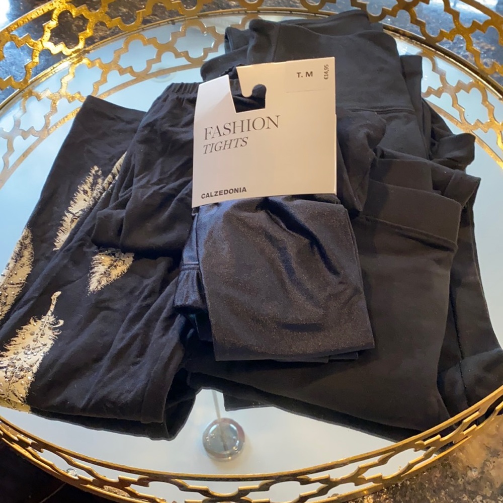 3 pairs of leggings and 1 pair of tights.